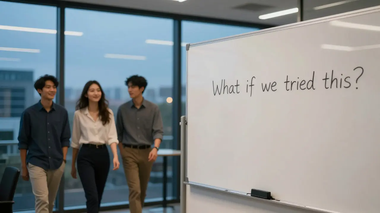 A whiteboard with just one question: 'What if we tried this?' in an empty conference room.