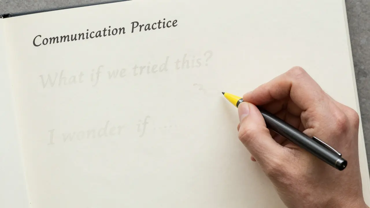 Hand writing a thoughtful note in a journal labeled 'Communication Practice'.